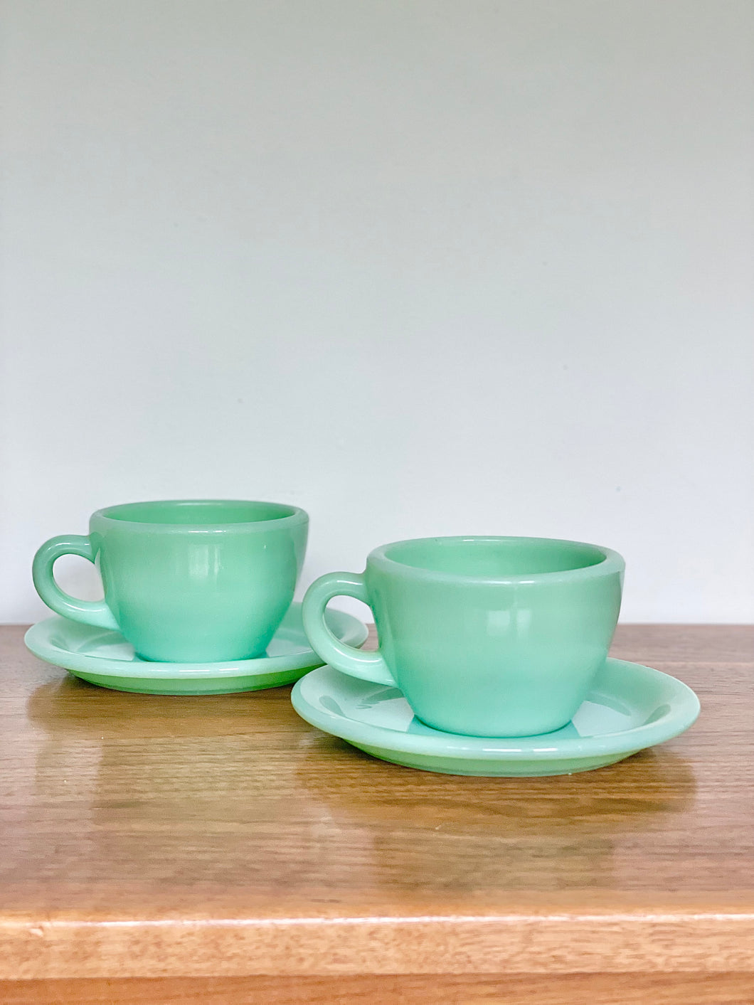 pair of fire king restaurantware cups & saucers